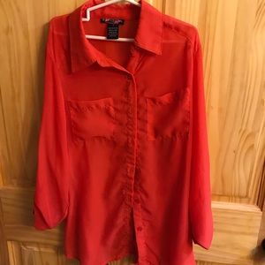 Orange button up shirt with lace detail